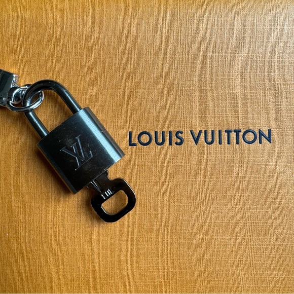 Louis Vuitton Handbags - Louis Vuitton Brushed Gunmetal Lock & Key #303